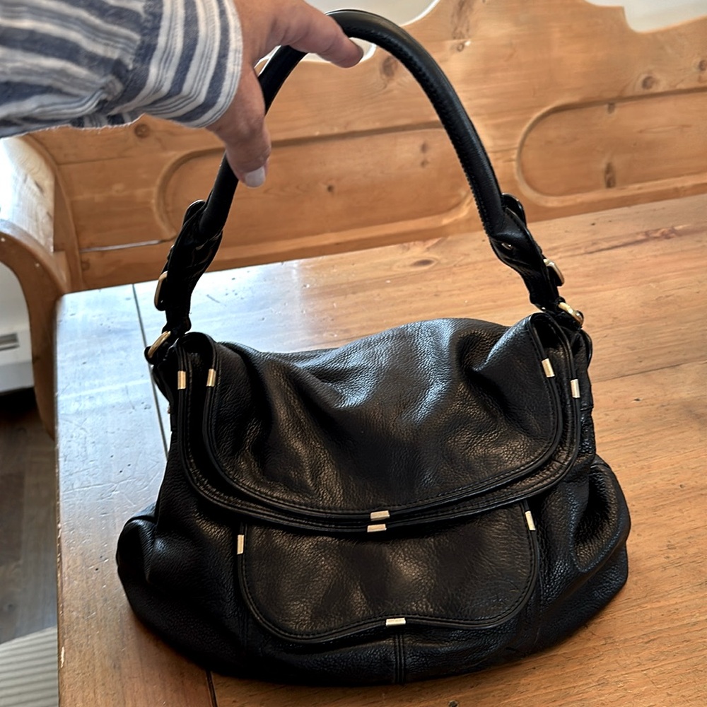 Handbag by B MAKOWSKY. Black soft leather/gold accents, Single pocket in outside